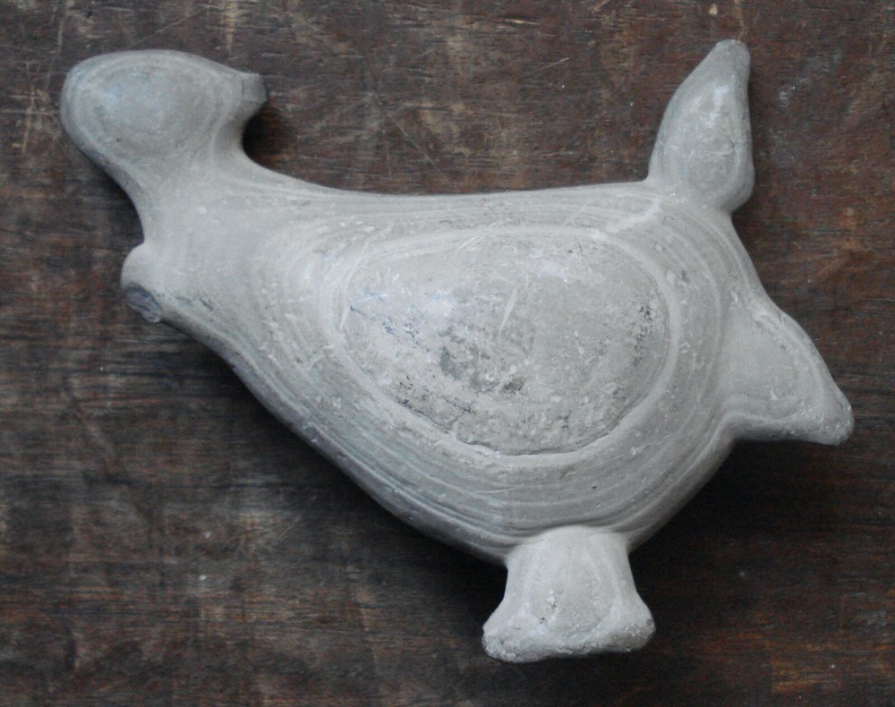 old stone animal form carving, unknown source