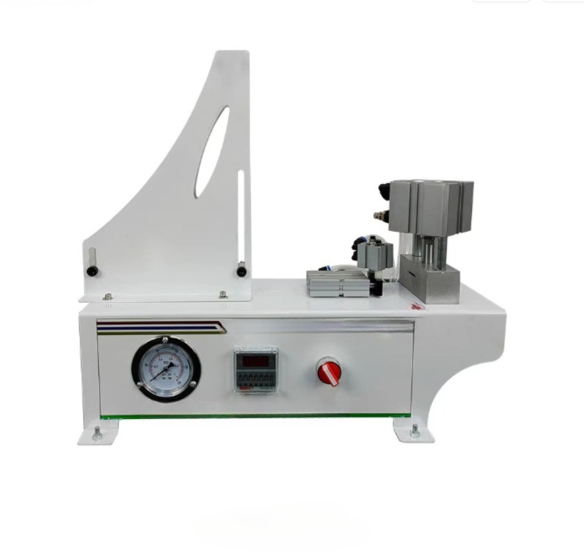 Full-automatic ring beauty paste punching god sealing strip punching machine