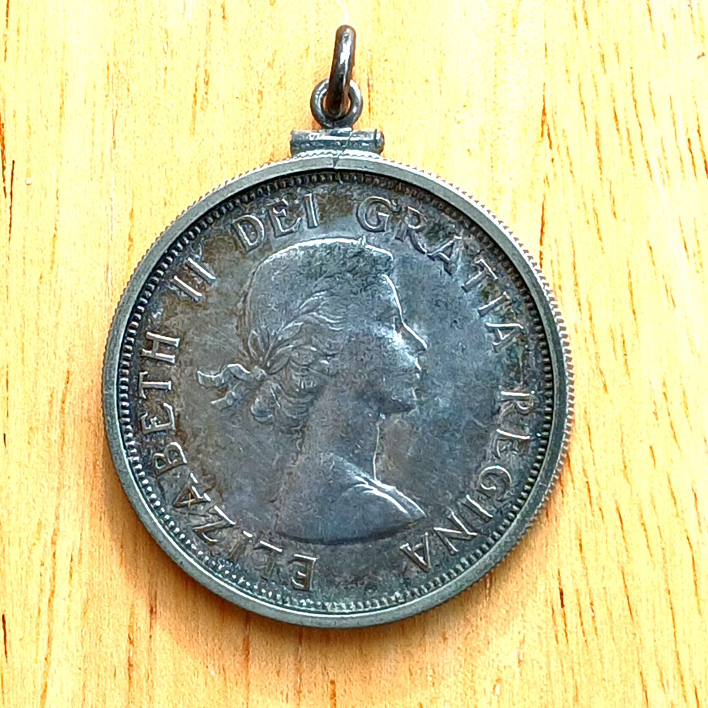1958 Silver Totem Pole Canada Dollar in Bezel Pendant