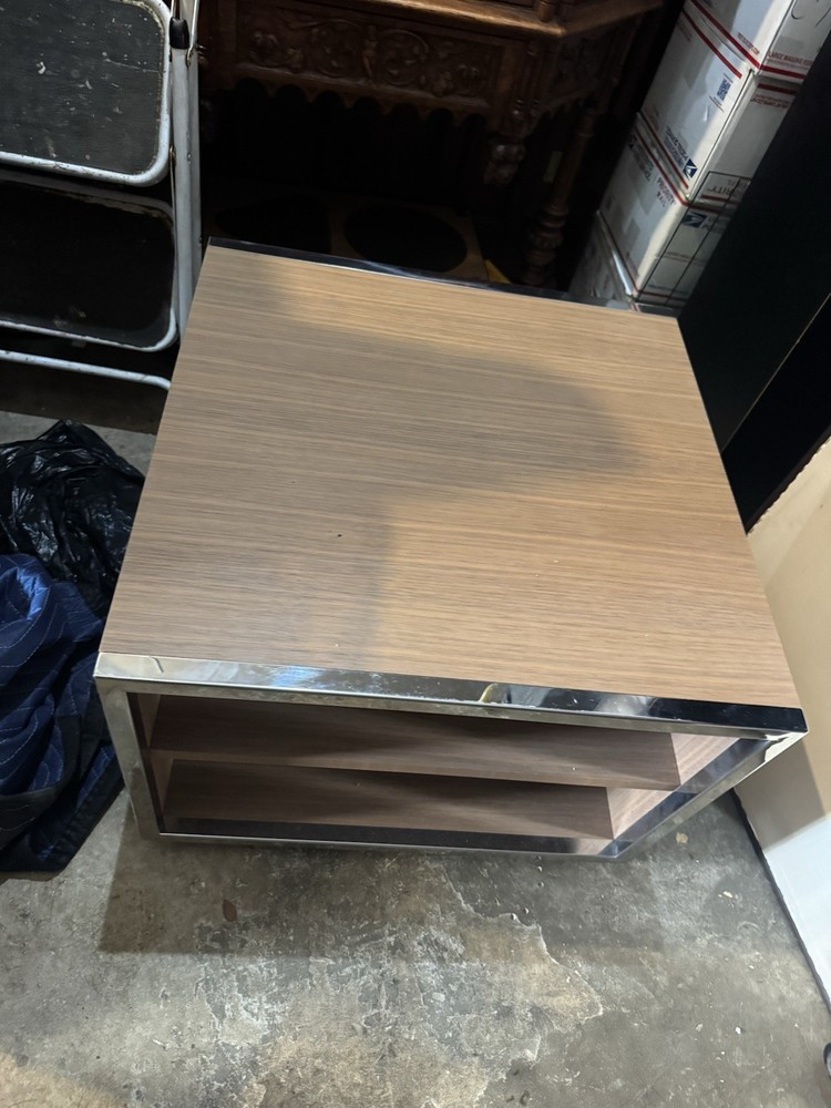 Minimalist side table,consistent with Minotti’s design likely the Hamilton