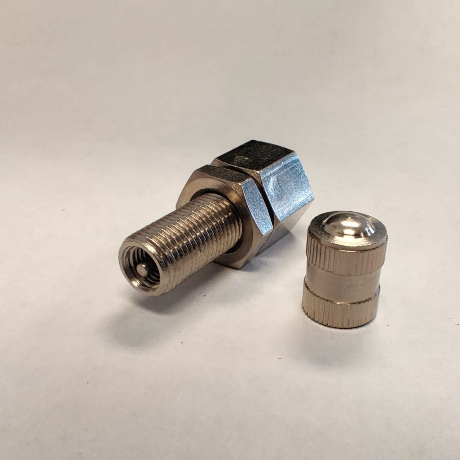 1/8" Female NPT Schrader Valve; Nickle Plated