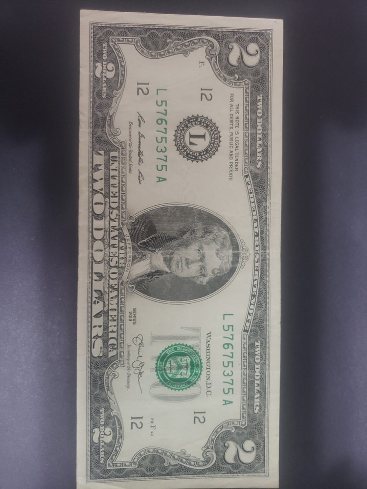 2 dollar bill error print