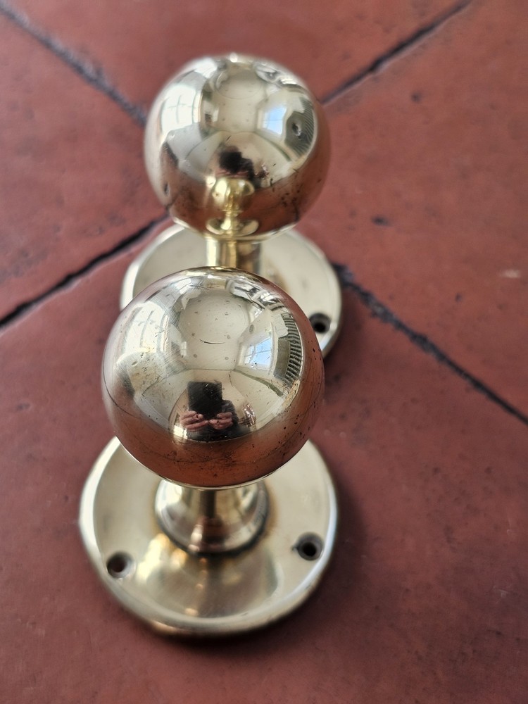 Antique original brass door knobs