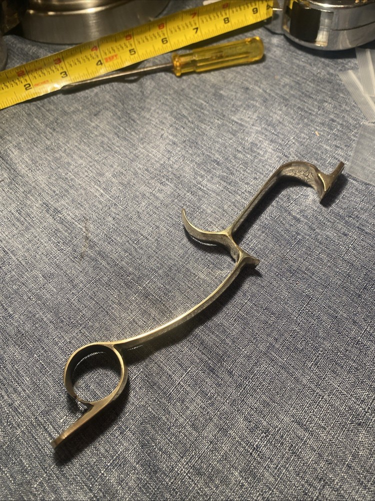 Brass Trigger Guard from a CVA Hawkins Muzzleloader With Screws.
