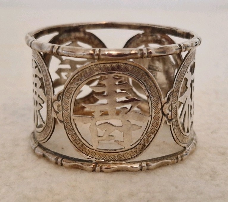 WANG HING 900 SILVER HALLMARKED DECORATIVE NAPKIN RING