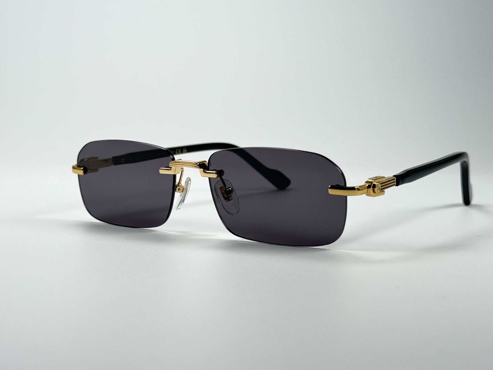 Gucci GG1221S 001 Black Gold Rimless Sunglasses Gray Lens 56mm