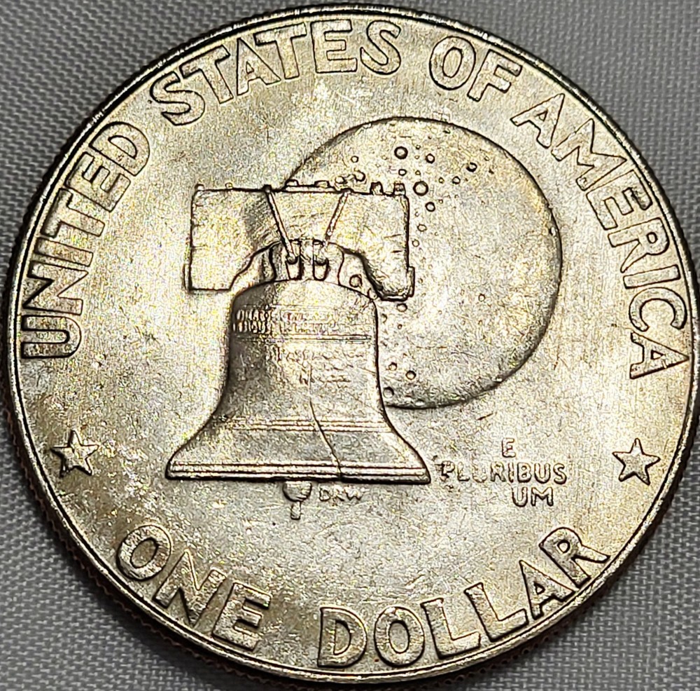 1976D Ike Select Uncirculated Struck Through Grease Reverse Motto #01.04.26f