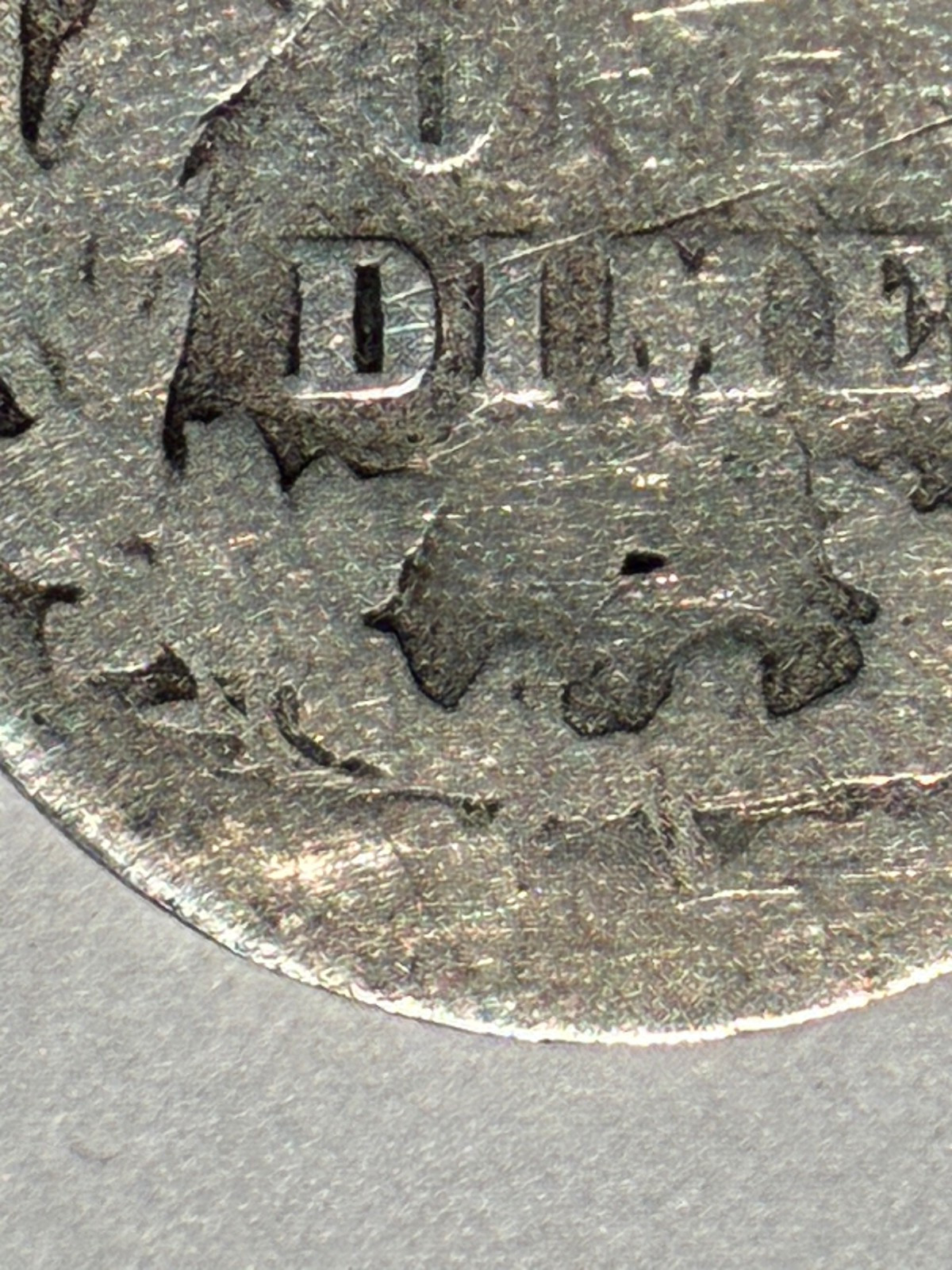 1895 Unknown Mint Barber Dime. Could be S or Plain, maybe O. Poor condition