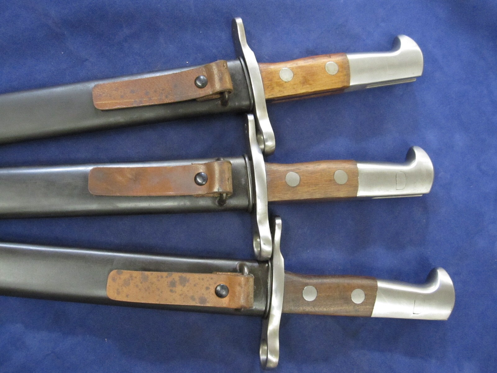 One Swiss K31 Bayonet with Scabbard - No Serials, Unissued - Blemished.