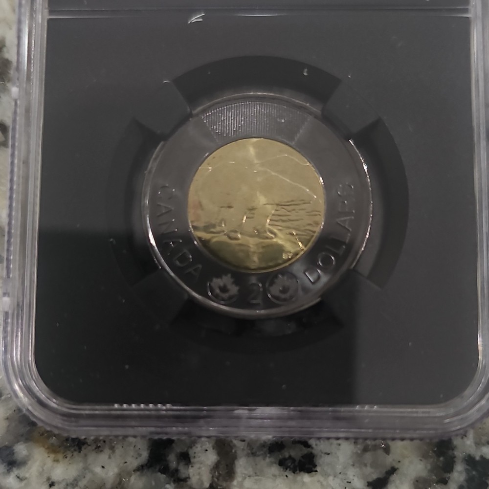 UNDER VALUE 2022 Canada $2 Polar Bear-First Release Blackened OuterRing NGC MS67