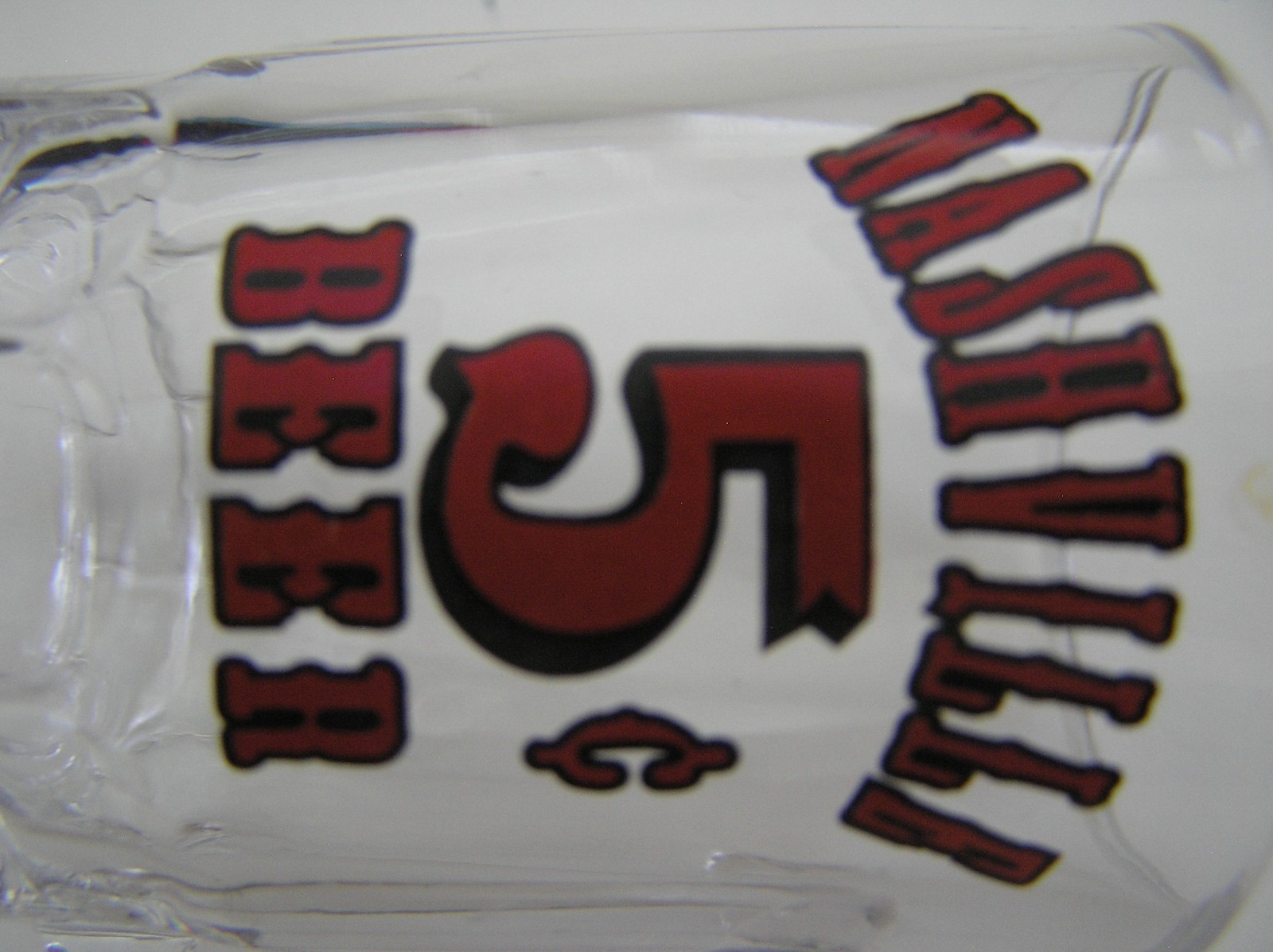 2 Souvenirs Shot Mugs: A Black Rumple Minze and A Clear Nashville 5cents Beer