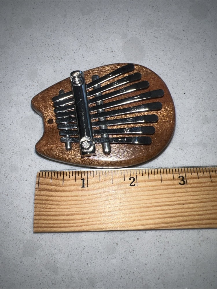 Mini 8 Key Thumb Piano Portable Beginners Finger Piano EUC