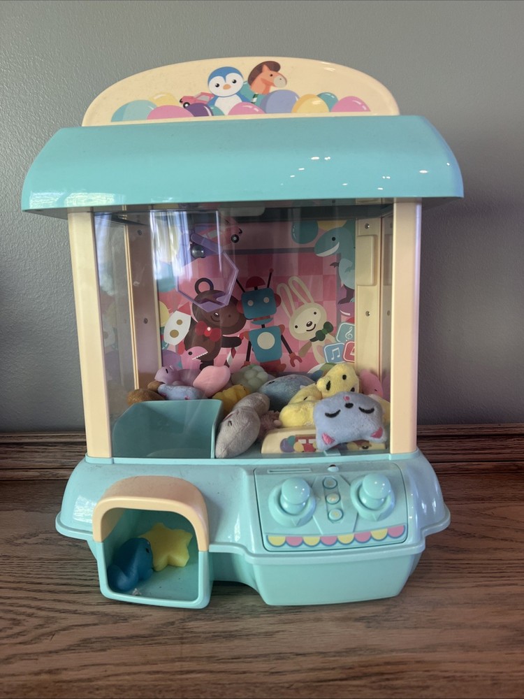 Mini Claw Machine – Lights, Music & Squishy Prizes!