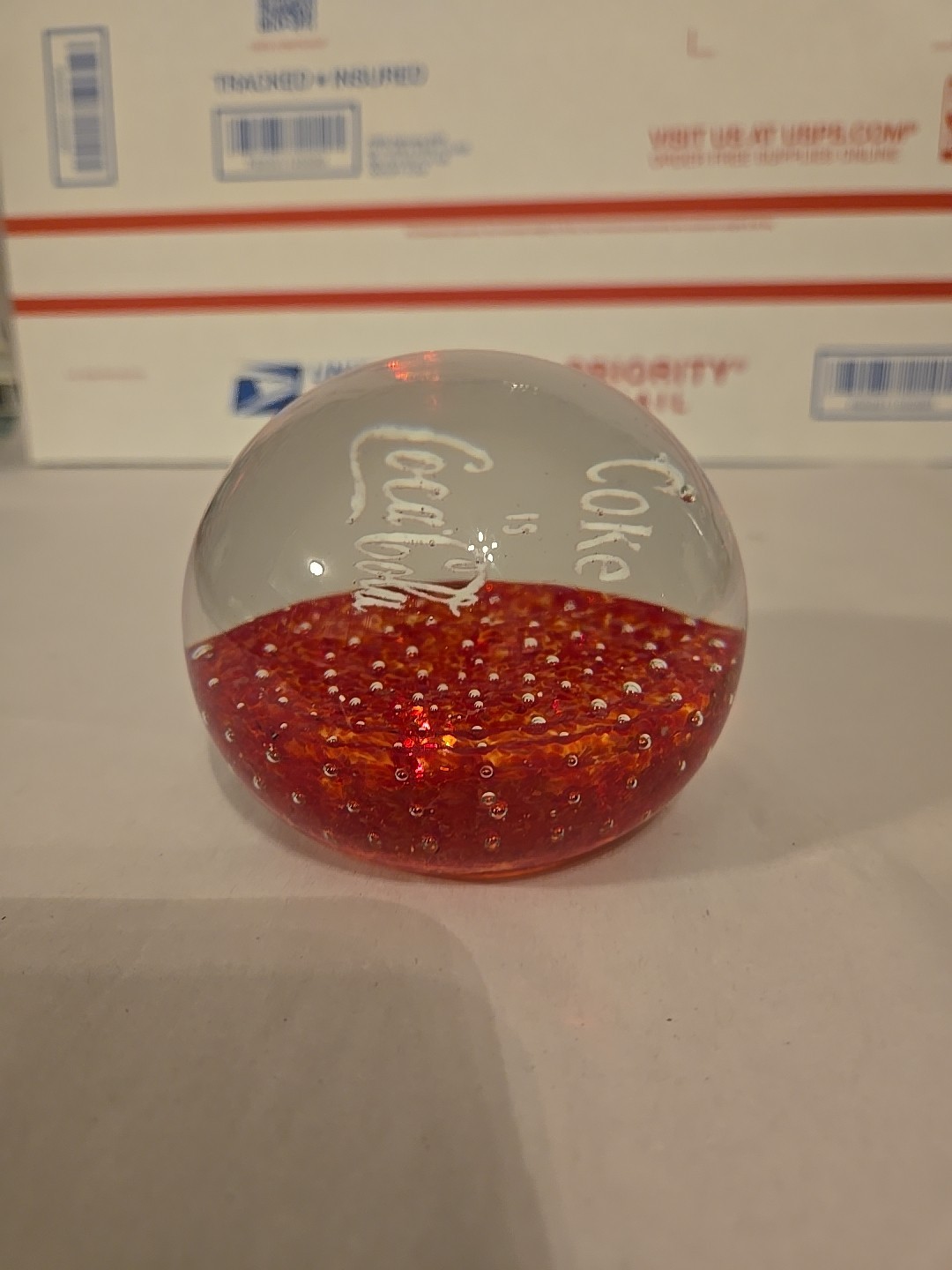 VINTAGE Red COKE IS COCA-COLA PAPERWEIGHT Clear Red With White Lettering