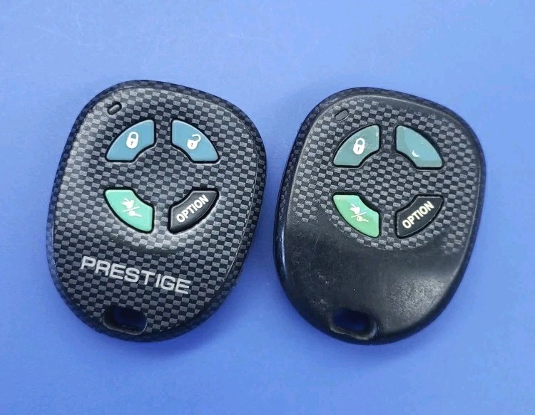 2x USED PRESTIGE REMOTE APS2K4MSFLCF ELVATCB - FLASHLIGHT DOES NOT WORK