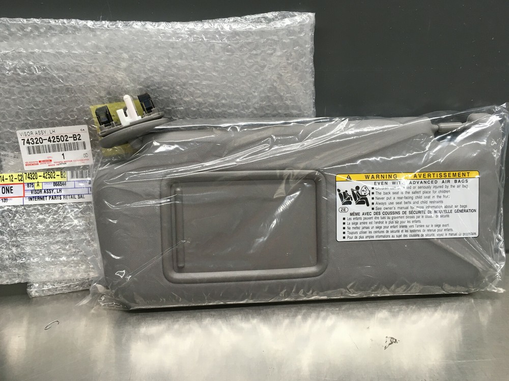 OEM  TOYOTA RAV4 DRIVER SIDE SUN VISOR FITS 2009-2012  GRAY