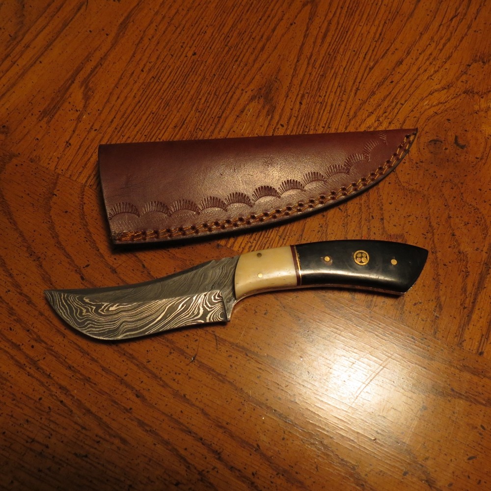 Damascus caping knife with white & black bone handle & leather sheath hand made
