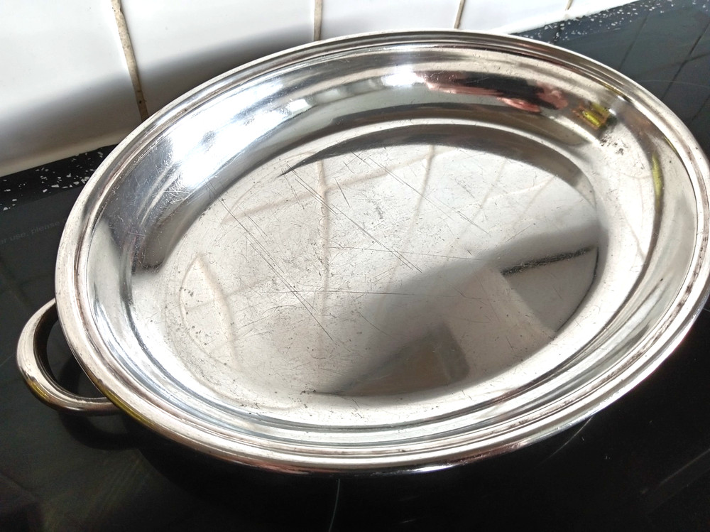 Silver plated twin handled 33 centimetre handle to handle bowl.