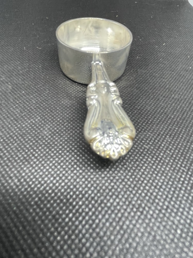 SILVER PLATED COFFEE MEASURE.