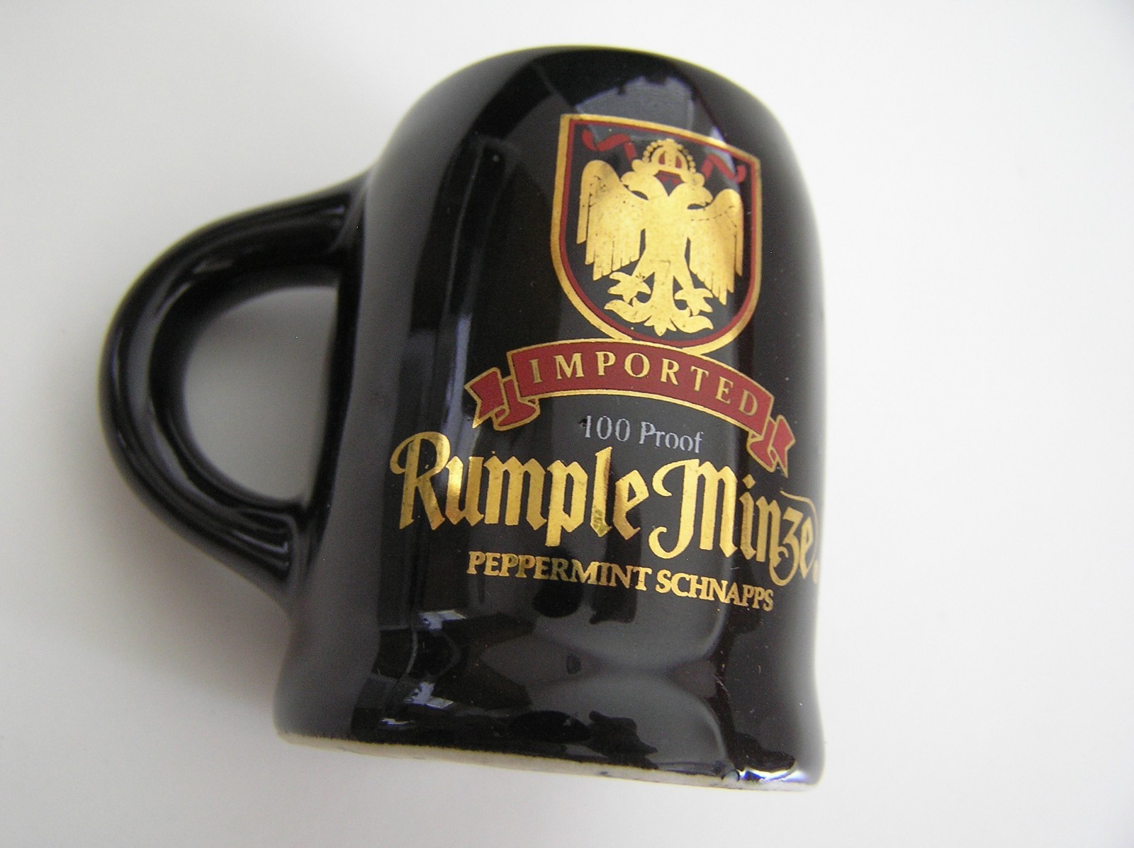 2 Souvenirs Shot Mugs: A Black Rumple Minze and A Clear Nashville 5cents Beer