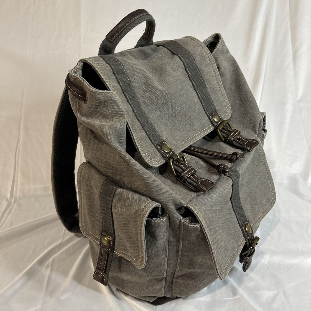 Cargoit Gray Canvas Backpack Magnetic Closures Pockets Straps and A Deep Inside