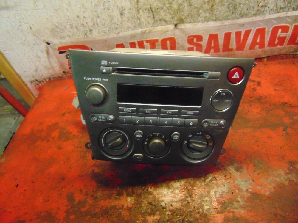06 05 Subaru Legacy outback cd player changer & climate control switch unit