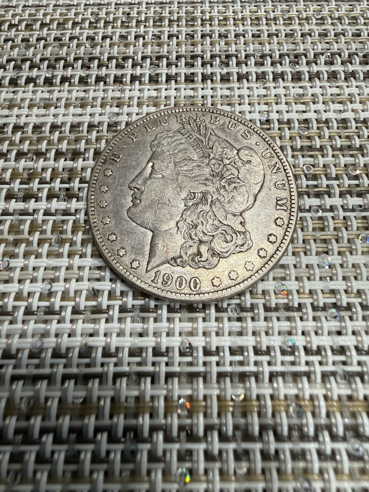 1900- O   Morgan Silver Dollar