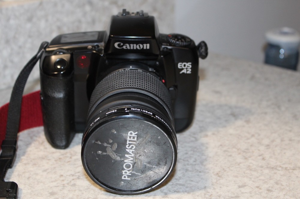 Canon EOSA2 Camera With- 72mm Promaster Lens W/ Strap & Case Bundle