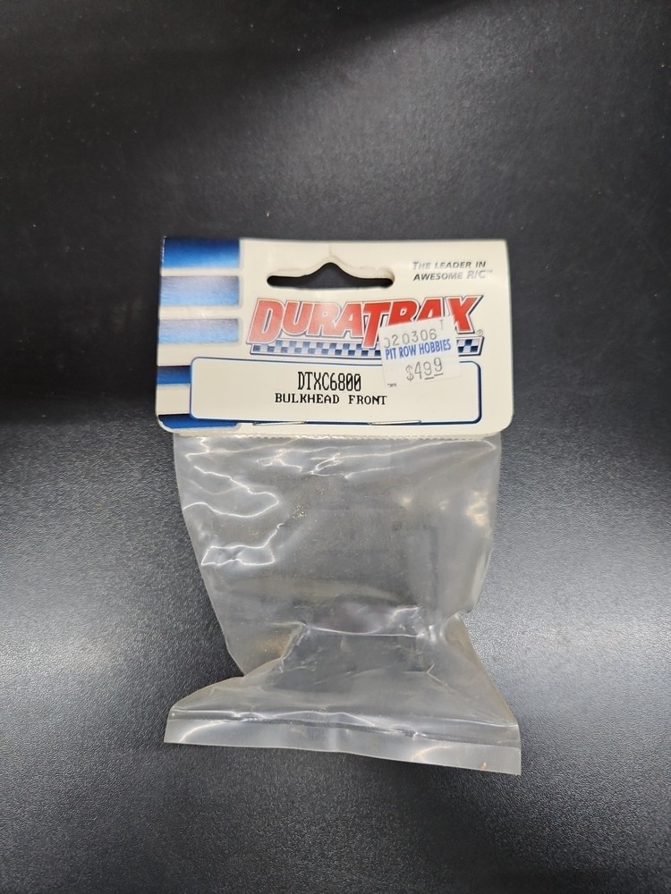 DURATRAX CHASSIS PART = DTXC6800 - FRONT BULKHEAD (NEW) (G8)