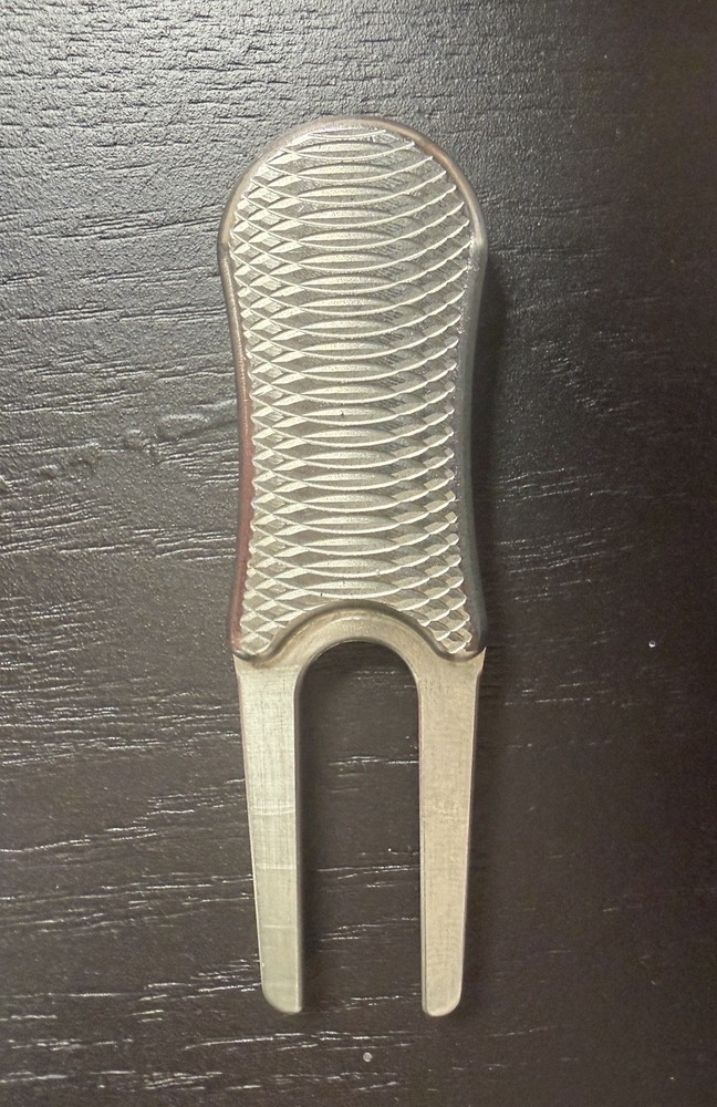 Gene Nead Stainless divot repair tool
