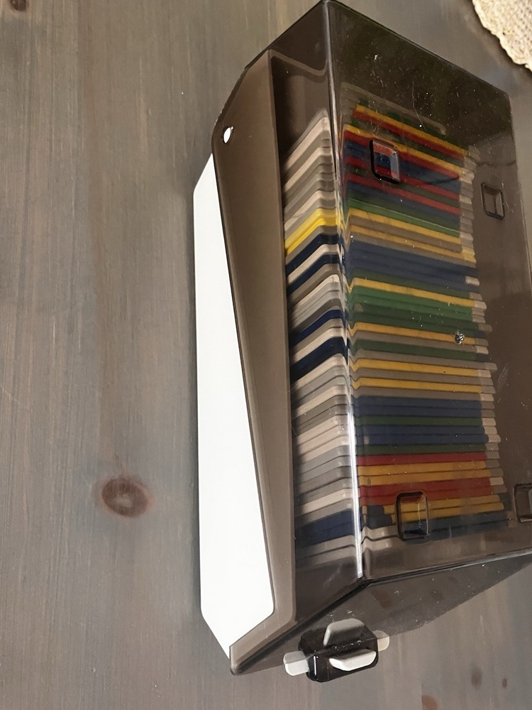 Commodore Amiga random 50 Disk Lot - 3.5" DS/DD. Includes Disk Caddy/Box