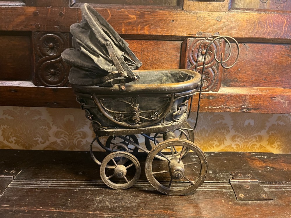 Vintage style toy pram.
