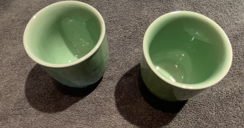 PAIR OF CERAMIC LIGHT GREEN 4.5” TEACUPS