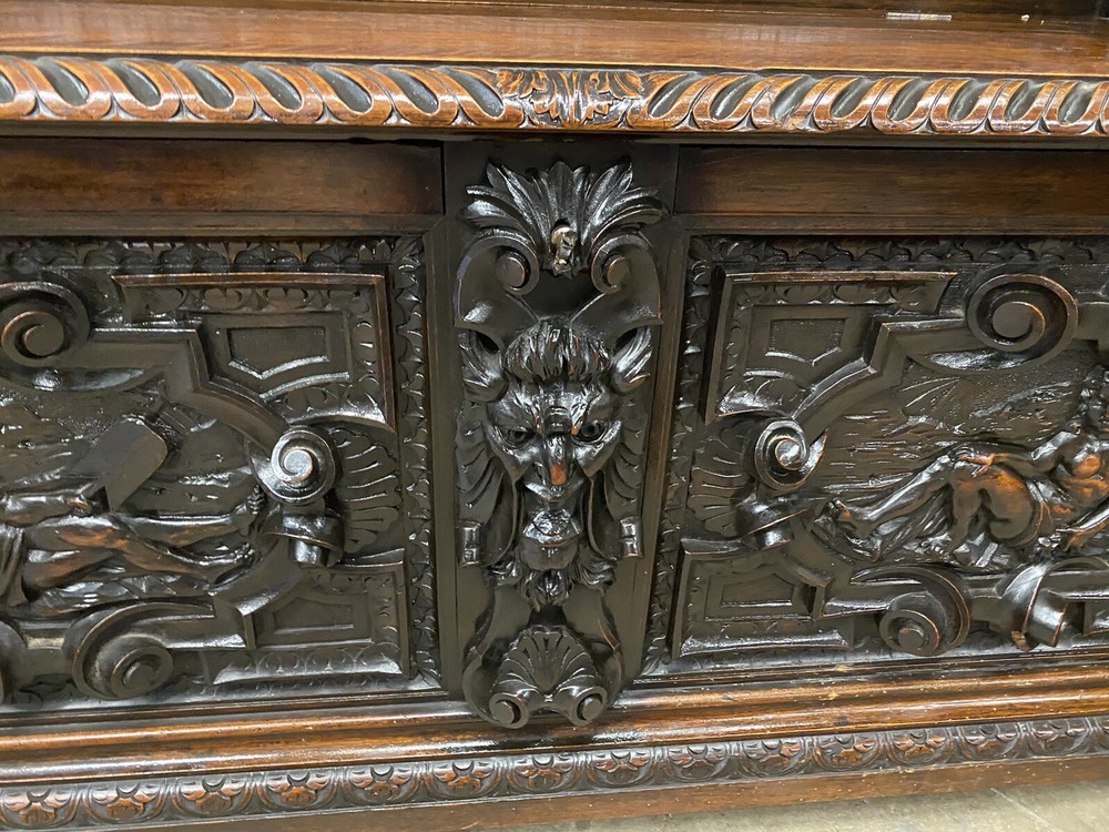 CARVED FIGURAL WALNUT BENCH
