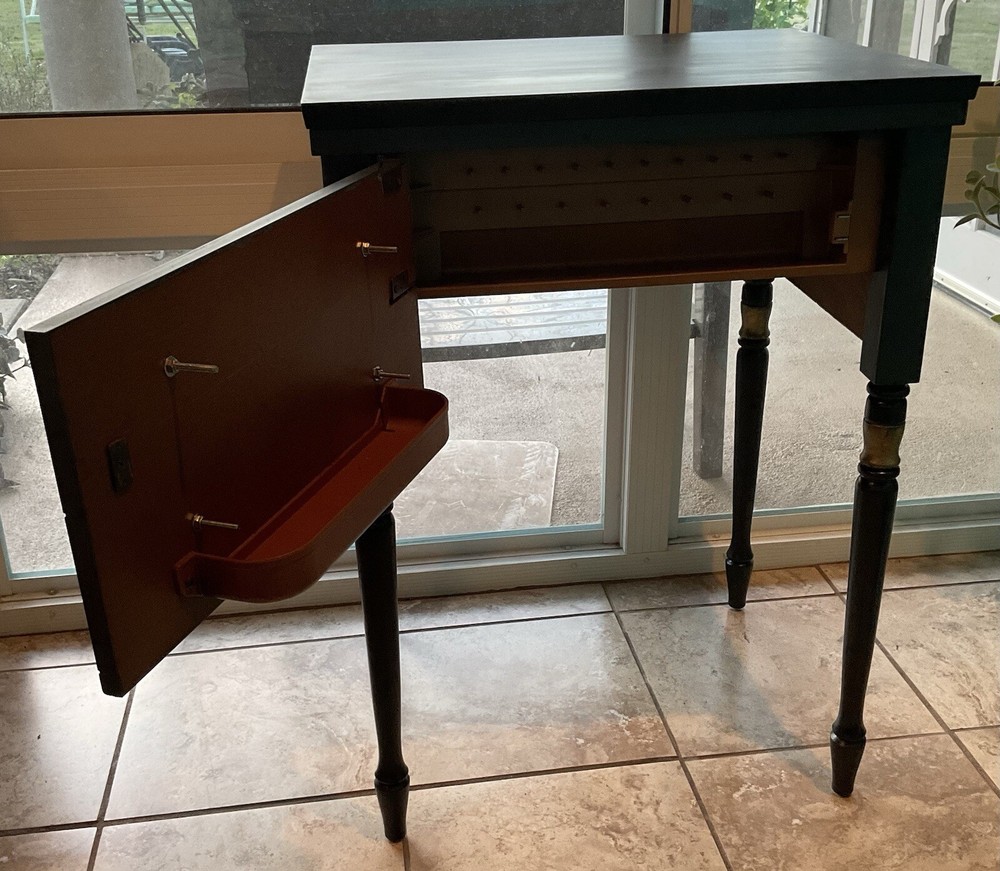 Sewing Machine Cabinet Makeover Into Black, Gray, And Gold Accent Table