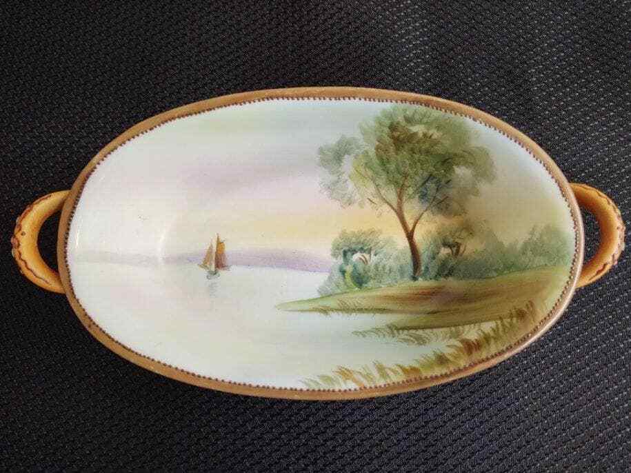 Nippon hand painted handled candy bowl/hand painted scene
