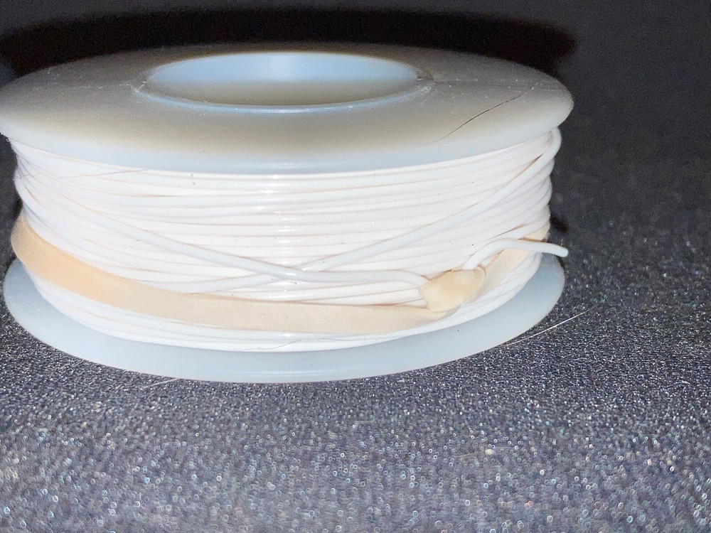 26 GA. Solid Strand Type "E" Teflon White M16878/4 200°C @ 600V   100 ft. spool