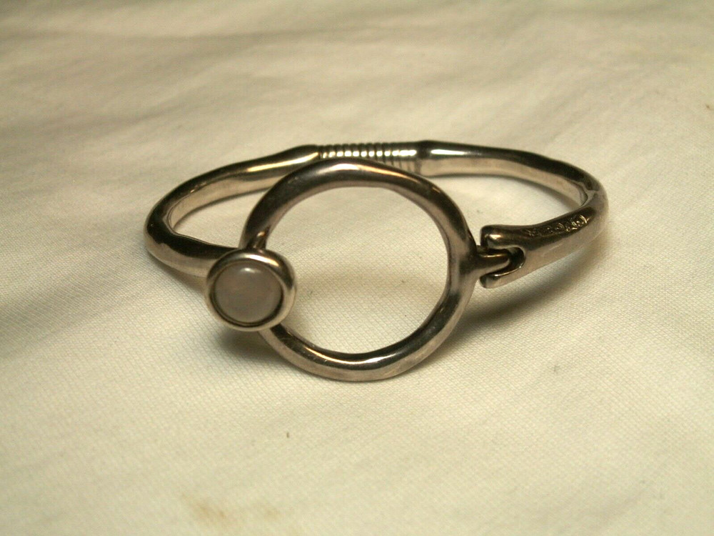 ...Unode50...Silver Tone, Quartz Hinged Bracelet...