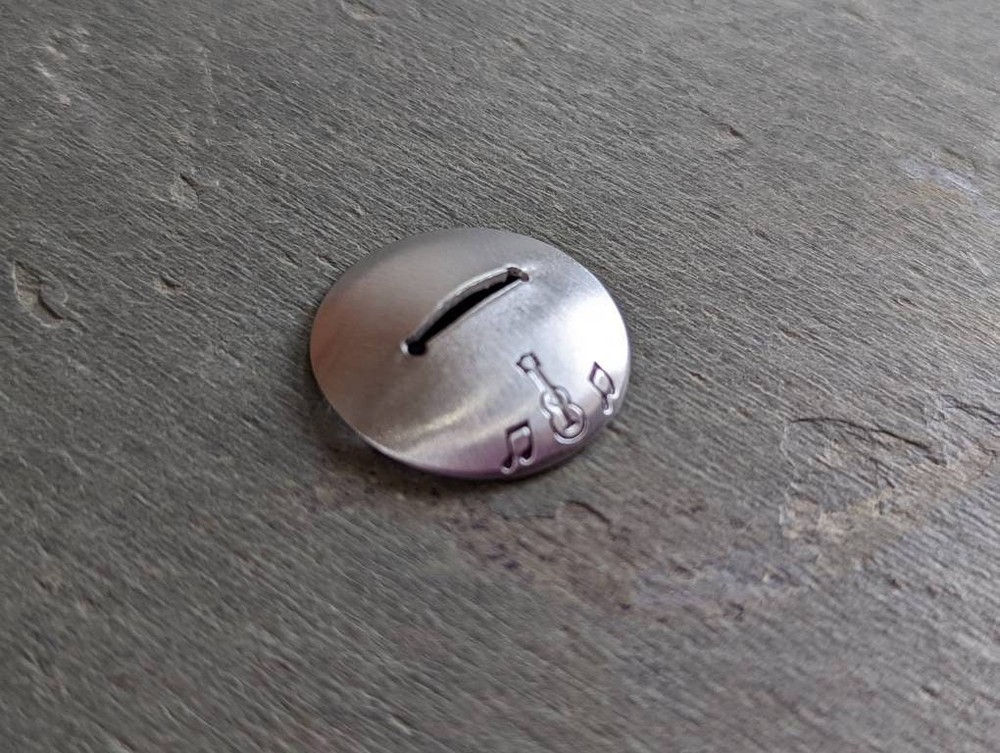 Sterling silver guitar pick stand with guitar and music notes