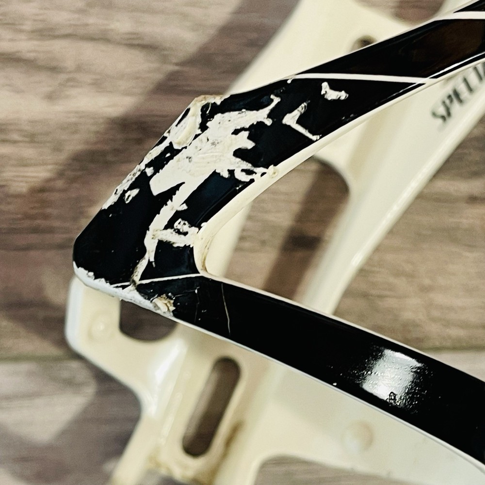 Used Specialized ZEE Bottle Cage Side Loading Right Entry White with Black