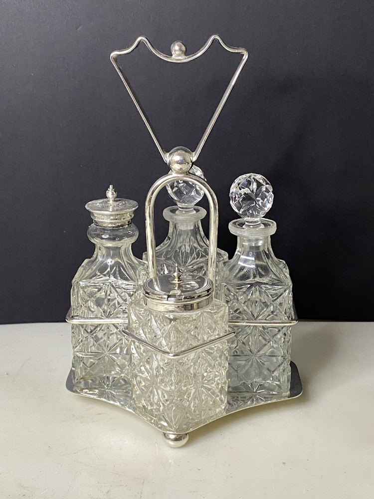 Antique 1889 Silver plate Cruet with 4 crystal bottles by ISG Sheffield England