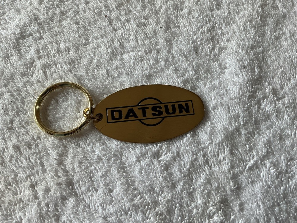 Brass Datsun Keychain, 2.5”x1.5” , Nice Shape