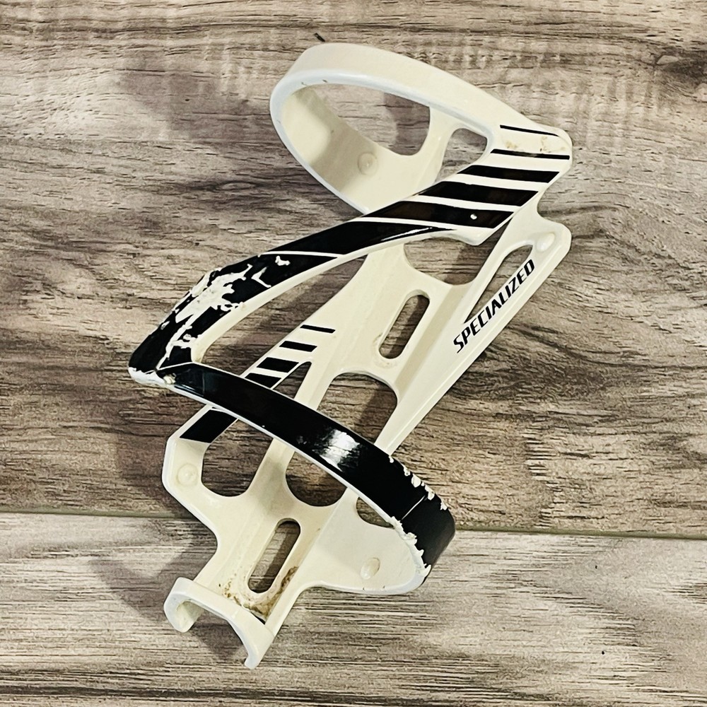 Used Specialized ZEE Bottle Cage Side Loading Right Entry White with Black