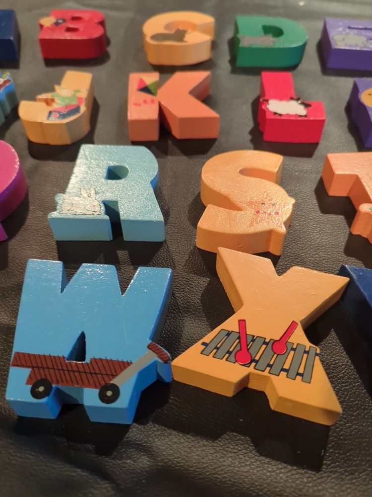 Solid wood alphabet letters in wood case