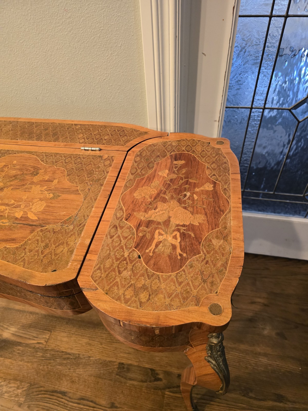 "Antique vanity table from the late 1800s with intricate inlay & a hidden mirror