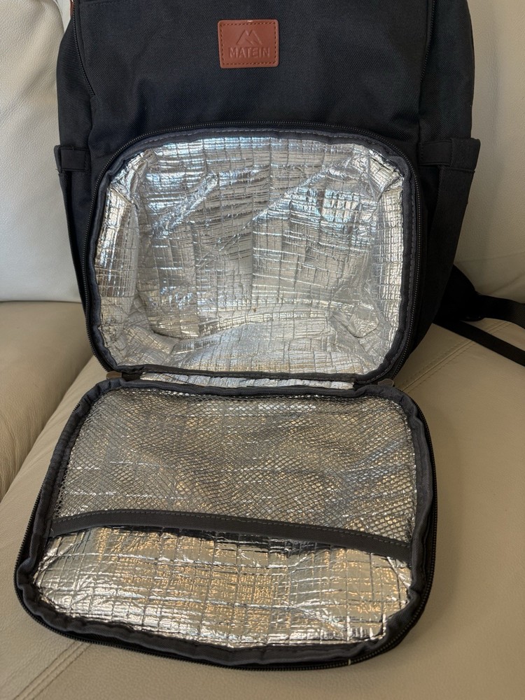 Matron Black Backpack With Built In Insulation Compartment As Well As Power Plug
