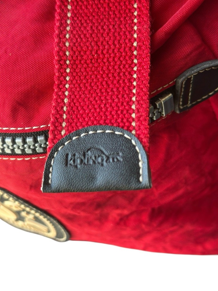 VTG 90’s Kipling Red Nylon Backpack Large Flap Buckle Drawstring Padded Back