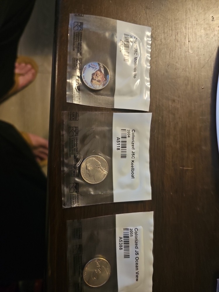 Three Colorized Coins