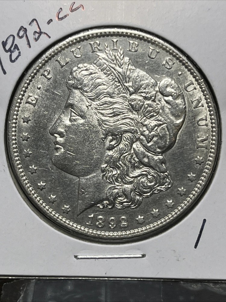1892-CC MORGAN SILVER DOLLAR, AU DETAILS