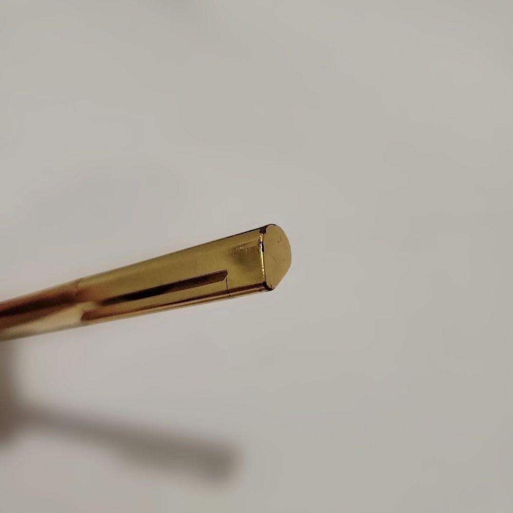 Gold twist ballpoint pen #b45d04
